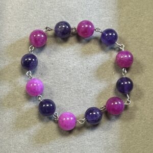 Handmade pink tourmaline and amethyst bracelet with natural polished gemstone beads