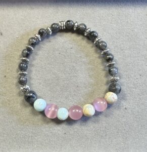 Handmade black labradorite bracelet with Tibetan bead, rose quartz, and royal blue jasper natural stones