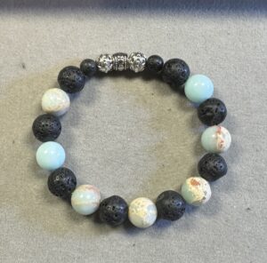 Handmade black lava stone and royal blue sea sediment jasper bracelet with natural matte and polished gemstone beads