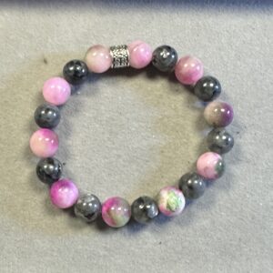 Handmade pink Persian jade and black lava stone bracelet with natural blush and matte volcanic gemstone beads